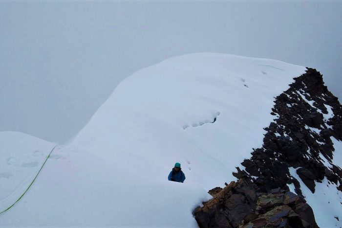 Himalayan Mountaineering Institute team member traversing from Mount Kang Yatse 2 to Kang Yatse 1