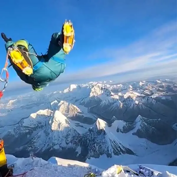 Devon Levesque does a backflip the summit of mount Everest.