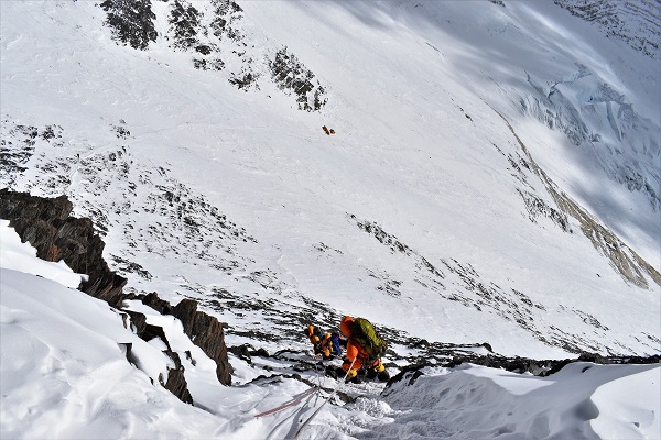 Descending from Geneva Spur. One can see yellow dots in the back which is the summit camp to the Lhotse peak.