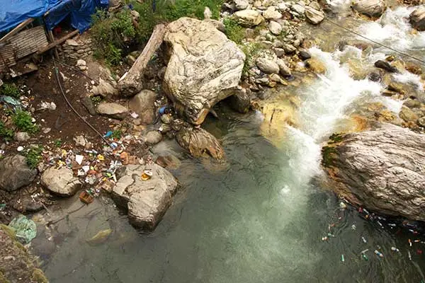 polluting the main stream of Kasol