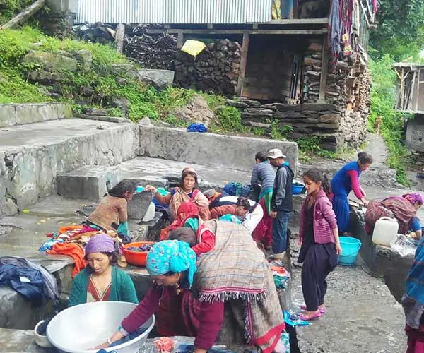 Malanai women at a public laundromat in the village