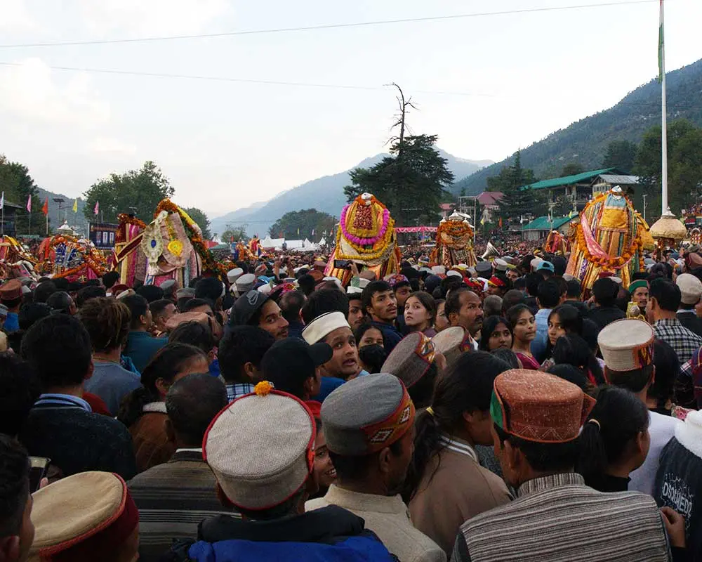 devotees and deities at the Dussehra ground