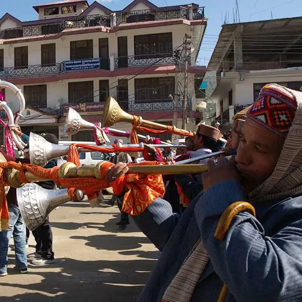 Deities are accompanied by drummers and trumpeters. 