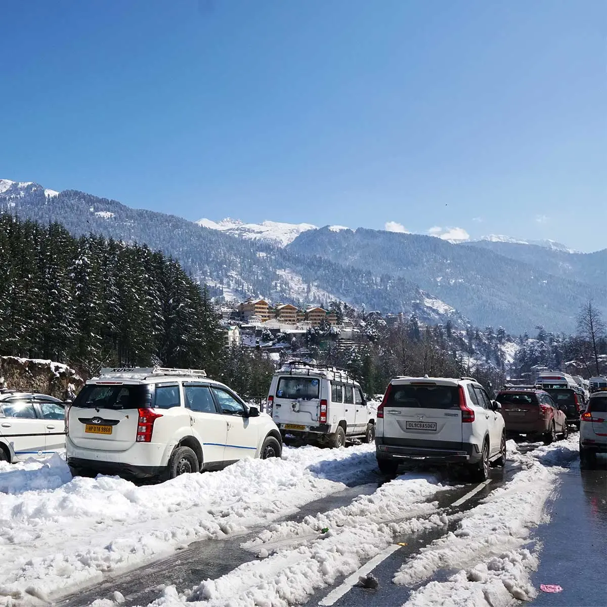 driving in Manali on roads covered with snow.