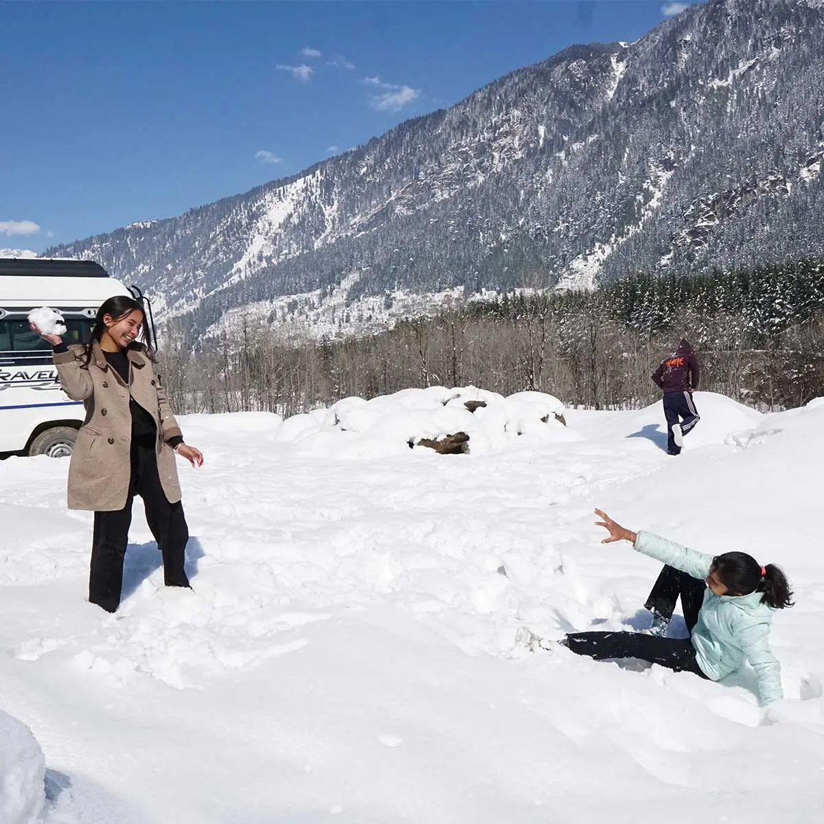 Children playing in snow in Manali.