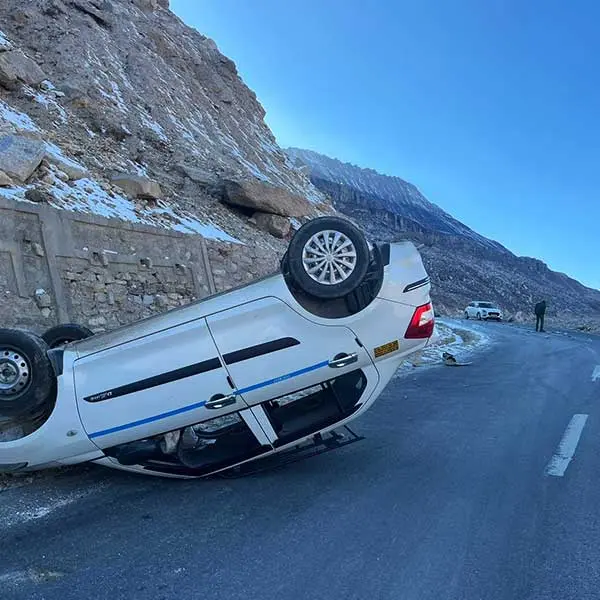 Reckless driving in the hills. A car turned turtle near Manali,